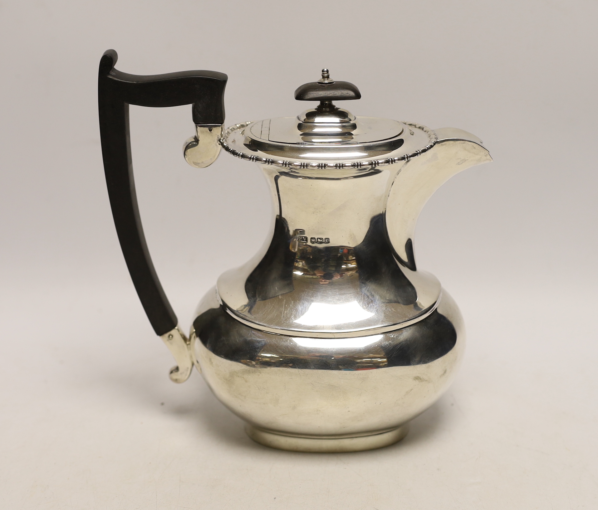 A George V silver hot water pot, Viners Ltd, Sheffield, 1936, gross weight 24.2oz.